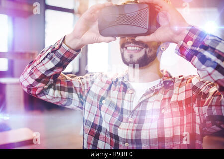 Man using virtual reality headset Stock Photo