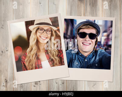 Composite image of gorgeous smiling blonde hipster posing Stock Photo