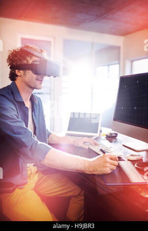 Businessman wearing virtual glasses Stock Photo