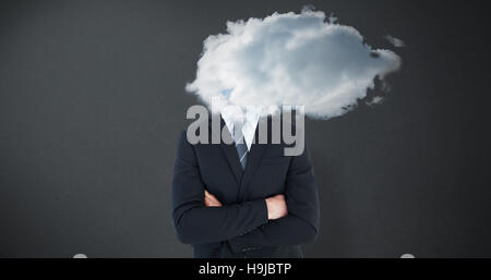 Composite image of frowning businessman looking at camera Stock Photo
