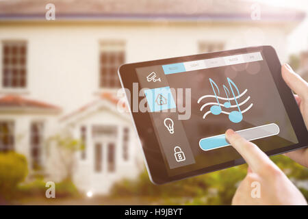 Composite image of man using tablet pc Stock Photo