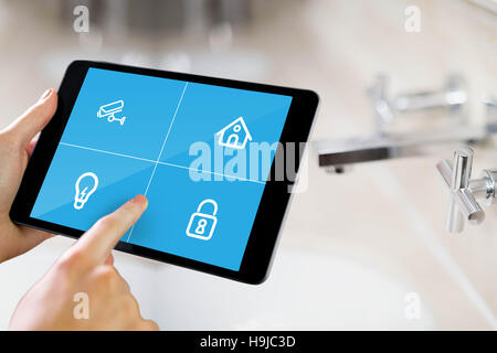 Composite image of man using tablet pc Stock Photo