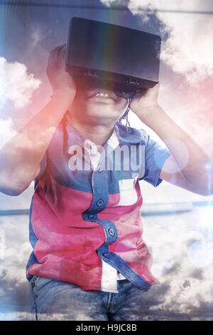 Boy using a virtual reality device Stock Photo
