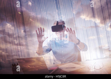 Businessman using an oculus Stock Photo