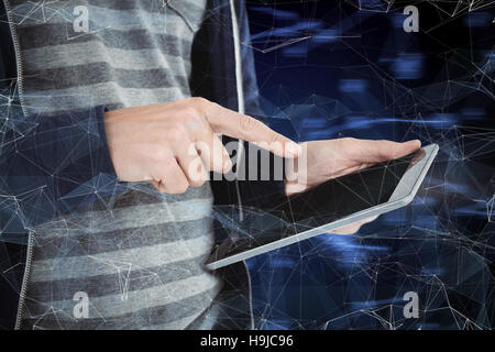 Composite image of cropped image of man using tablet Stock Photo