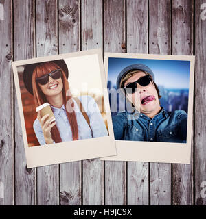 Composite image of smiling hipster woman drinking coffee Stock Photo