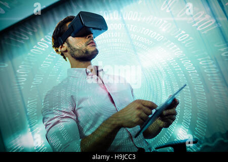 Composite image of spiral of shiny binary code Stock Photo