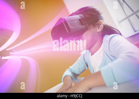Girl using a virtual reality device Stock Photo