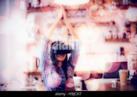 Young woman using the virtual reality headset Stock Photo