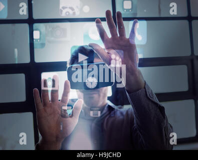 Composite image of futuristic app icons floating in light Stock Photo