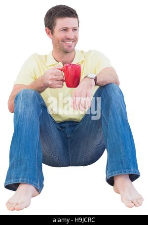 Smiling man drinking coffee Stock Photo