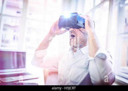 Man using a virtual reality device Stock Photo