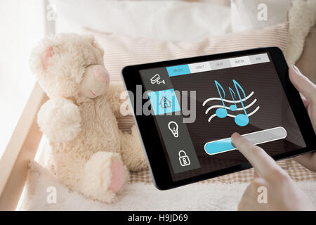 Composite image of man using tablet pc Stock Photo