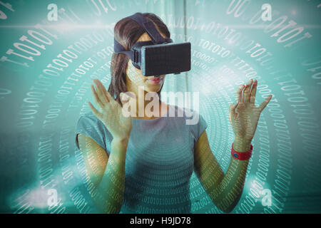 Composite image of spiral of shiny binary code Stock Photo