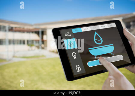 Composite image of man using tablet pc Stock Photo