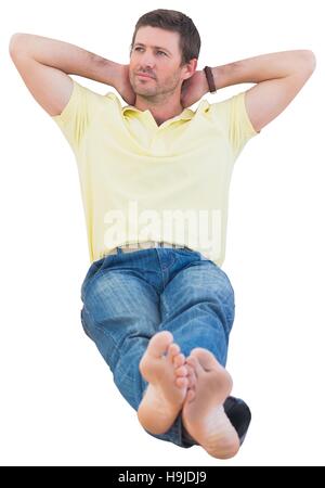 Thoughtful man sitting Stock Photo