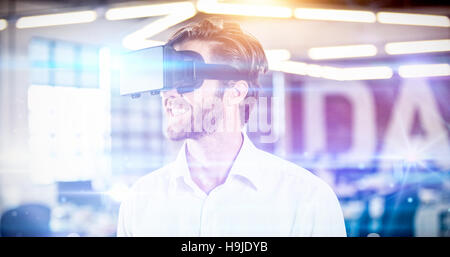 Businessman using virtual reality simulator Stock Photo