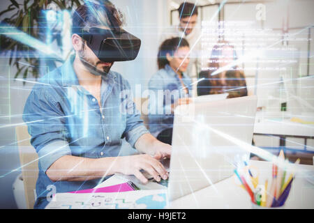 Composite image of blue lines next to screens and text Stock Photo