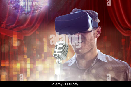 Composite image of man using an oculus Stock Photo