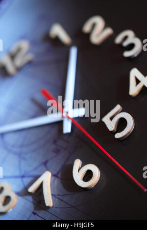 Bisiness concept. Closeup of clock face on dark background with draft Stock Photo