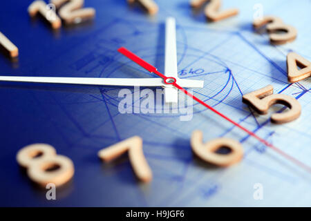 Bisiness concept. Closeup of clock face on dark background with draft Stock Photo