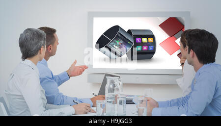 Composite image of attentive business team during a conference Stock Photo