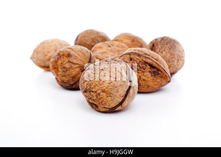 Walnuts on white background. Walnut texture. Stock Photo