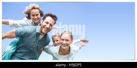 Happy parents with their children Stock Photo