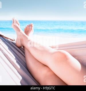 Woman relaxing in the hammock Stock Photo