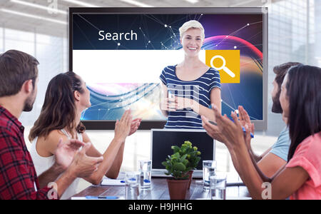 Composite image of colleagues clapping hands in a meeting Stock Photo