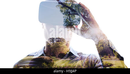 Composite image of man using an oculus Stock Photo