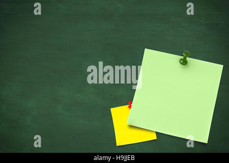 Composite image of green sticky note with thumbtack Stock Photo