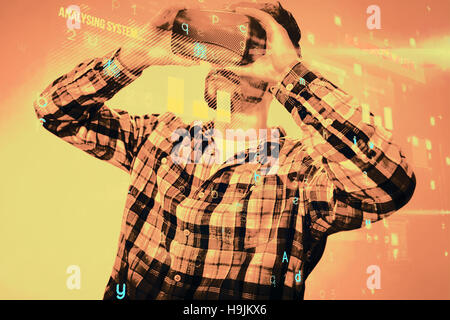 Composite image of man using an oculus Stock Photo