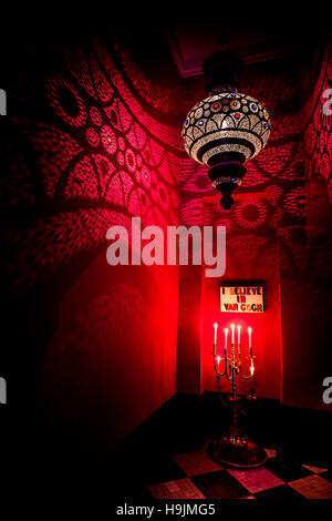 Traditional Moroccan lantern and candles lit up at night Stock Photo