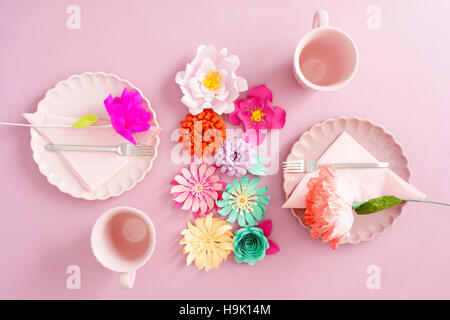 Table with paper flowers Stock Photo