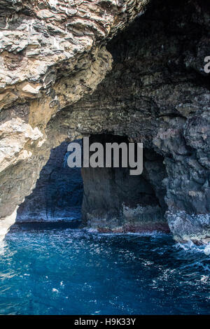 Cave at the Na Pali Coast on the northern coast of Kauai, Hawaii, USA. Stock Photo