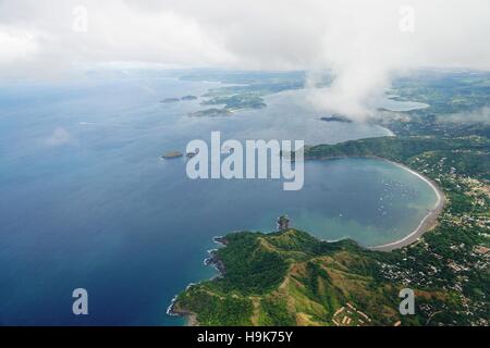 Aerial view in the clouds of the Golfo del Papagayo with the Peninsula Papagayo near Liberia in the Guanacaste Province Stock Photo