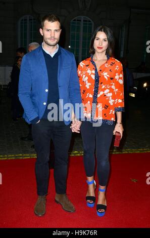 Jamie Dornan and Amelia Warner attend the Mum's List premiere at the Curzon Mayfair, London. Stock Photo