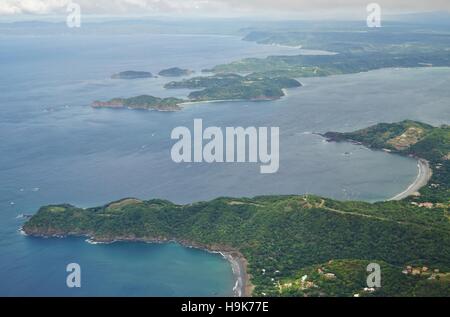 Aerial view in the clouds of the Golfo del Papagayo with the Peninsula Papagayo near Liberia in the Guanacaste Province Stock Photo