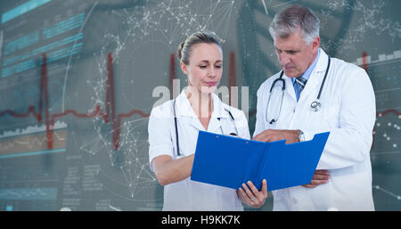 3D Composite image of male and female doctors discussing over notes Stock Photo