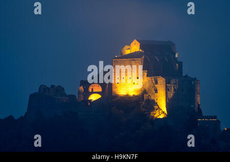 The Sacra di San Michele monastery in the cold winter mist Stock Photo