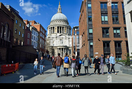 London, England, UK. People walking up Peter's Hill towards St Paul's Cathedral from the Millennium Bridge Stock Photo