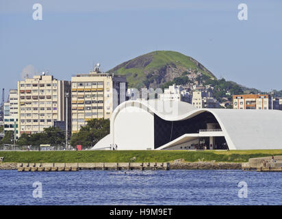 Brazil, State of Rio de Janeiro, Niteroi, Caminho Niemeyer and Teatro Popular Oscar Niemeyer viewed from the Guanabara Bay. Stock Photo