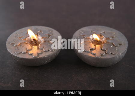 Silver Christmas candles with snowflakes. Christmas decoration. Stock Photo