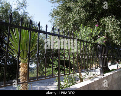 Black wrought iron railings at property in Corfu Greece Stock Photo