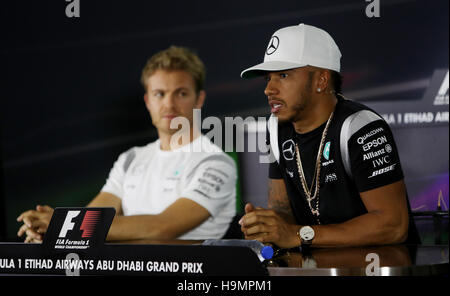 Mercedes driver Nico Rosberg, left, of Germany, and Red Bull driver ...