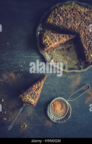 Sweet homemade chocolate cake on the dark background Stock Photo