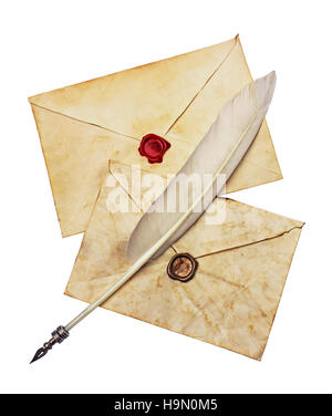 Two old envelopes with red and brown seal wax and feather pen isolated on white Stock Photo