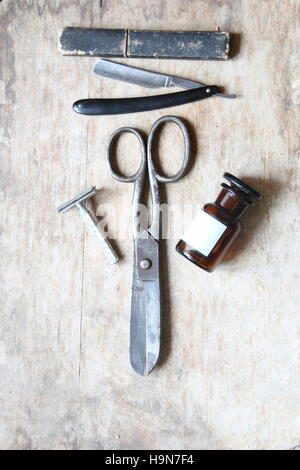 Vintage tools of barber shop on old table Stock Photo