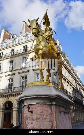 The gilded bronze statue of Jeanne d'Arc on Place des Pyramides in Paris, France Stock Photo